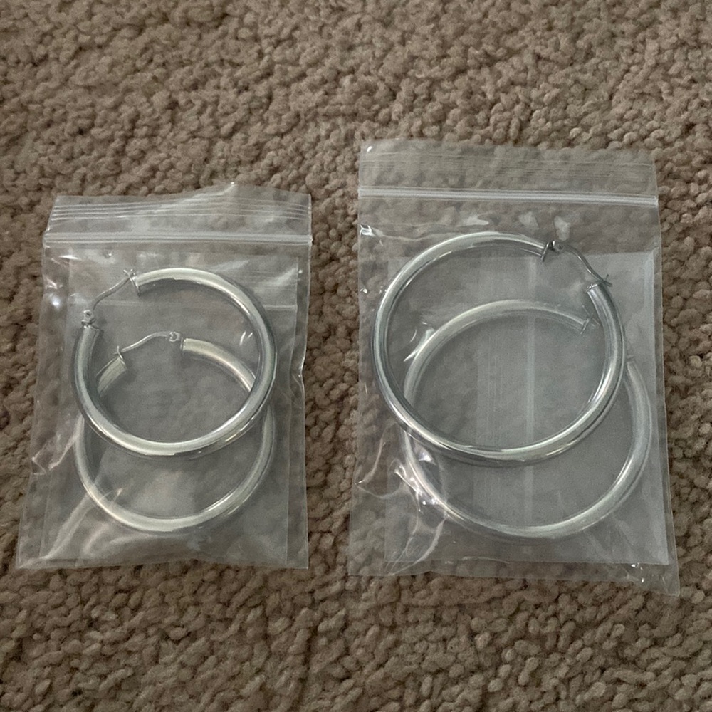 Two pairs of stainless steel hoops
